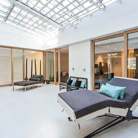 Central With Picturesque Mountain & Lake Views