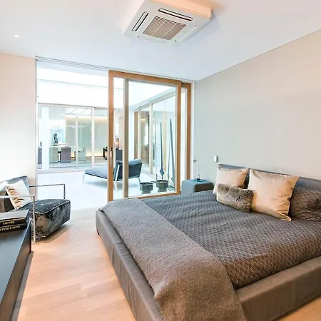 Central With Picturesque Mountain & Lake Views